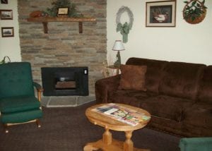 living room with gas fireplace at Olde Gatlinburg Place